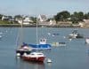 Boats floating in marina at high tide in La Trinité-sur-Mer in Morbihan, Brittany