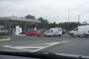 Cars queuing up to refill at a French service fuel station