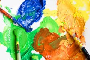 Blue-green-orange-yellow paint-paintbrushes
