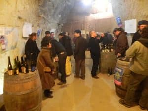 Wine tasters at a tasting session in a French chateau