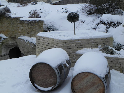 Wine barrels in snow