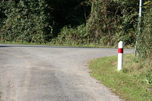 French road signs - white post with a red band