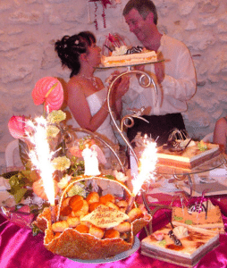 Several-tiered wedding cake on swan-shaped stand