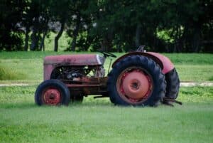 Old rusty tractor on farm